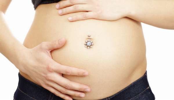 из-за чего может возникать боль в области пупка при беременности на ранних сроках