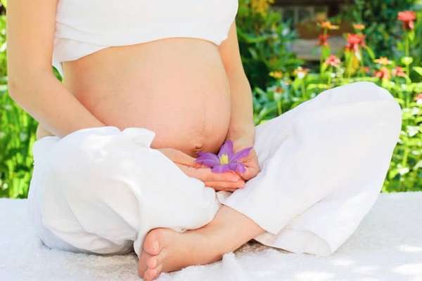 Почему болит живот при беременности
